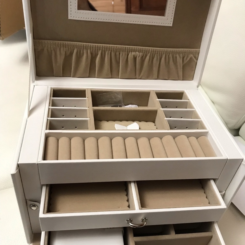 This is my first Poshmark sale ! White exterior , new accessory/jewelry box
